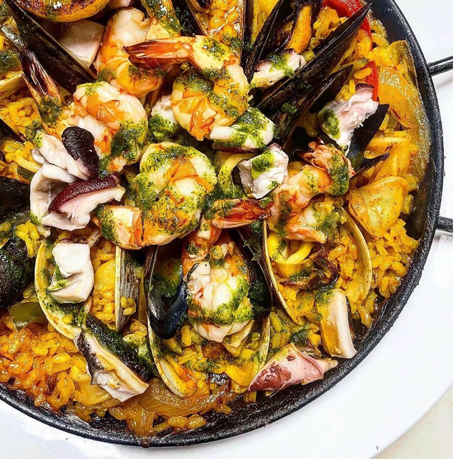 Paella marinera with shrimp, mussels, clams and octopus at Lunera Astoria